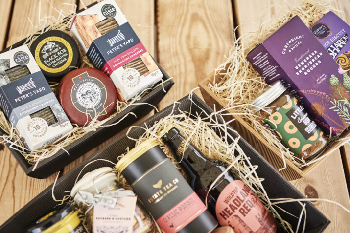 Three Hampers of Varying Sizes on a wooden table