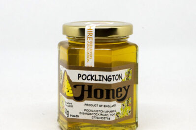 Local Honey on a white background